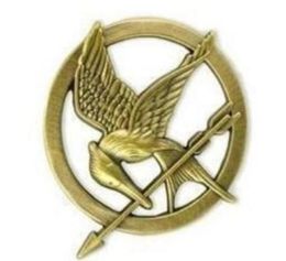 Film The Hunger Games Mockingjay Pin Gold plaqué oiseau et broche Arrow Gift9647928