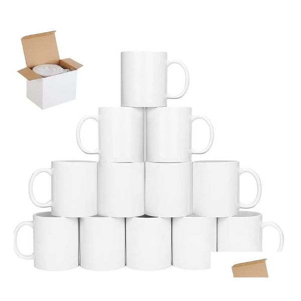 Tazas Tazas de sublimación de 11 oz Café sublimado en blanco con mango grande Taza de cerámica revestida blanca Caja de regalo Entrega de entrega Home Garden Kitche DHQHD