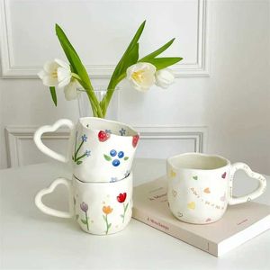 Tasses 350 ml Créative Ceramic Coffee Cup Ins Style peint à la main Cœur de fleur à la main Pobsole de thé irrégulier tasse de lait de lait de petit déjeuner J240428