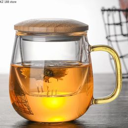Tazas Taza de infusor de té de vidrio creativo con mango de filtro transparente Tapa de bambú Taza de té de flores resistente al calor Taza de oficina Drinkware 231010