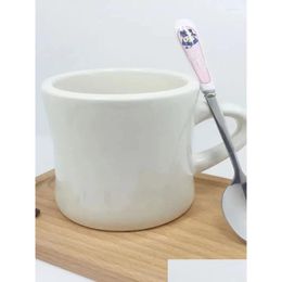 Tasses Tasse de taille créative lait blanc tasse de dessin animé en céramique minimaliste publicité café mignon livraison directe maison jardin cuisine barre à manger Otnha