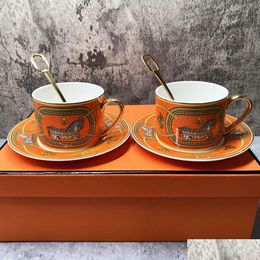 Tazas Tazas de té de lujo y platillos Conjunto de 2 Fine Bone China Café Mango dorado Royal Porcelana Party Espresso 230731 Entrega de gota Hom Dh2Rc