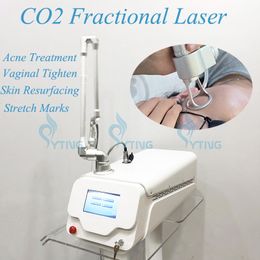 Machine professionnelle au laser CO2 fractionnaire Resserrement vaginal Enlèvement des cicatrices Dissolvant de marques de piqûre Traitement des rides Équipement de resurfaçage de la peau
