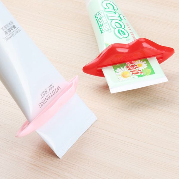 Exprimidor de pasta de dientes multifunción Venta al por mayor Sexy Hot Lip Kiss Baño Dispensador de tubos Exprimidor Home Tube Rolling Holder Squeezer HHE1378