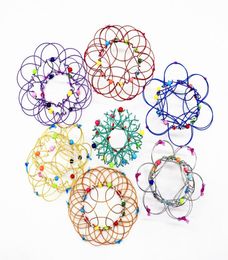Meerdere veranderingen Mandala Bloemenmand Magic Flow Ring Fidget-speelgoed Handgemaakt Gekleurde ijzeren lussen Draad Anti-stress Vingerplezier Gam9510820