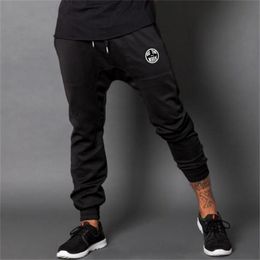 MuscleGuys Joggingbroek Mannen Joggers Sportscholen Broek Mannen Streetwear Hip Hop Broeken Heren Sweatpants Pantalon Homme Sporting Broek 210421