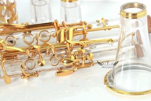 Instrumento musical clarinete de cuerpo transparente acrílico Bb con llave chapada en oro