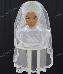 Veaux de mariage musulmans avec perles et applications en dentelle Pictures de modèle réelles prêtes à porter le hijab de la mariée du coude Hazir Gelin Turban8845038
