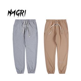 NAGRI Hombres Casual Sweetpants Sportswear Joggers Fitness Running Pantalones sueltos Diseño Pantalones deportivos Hip Hop Verano Nuevo 201110