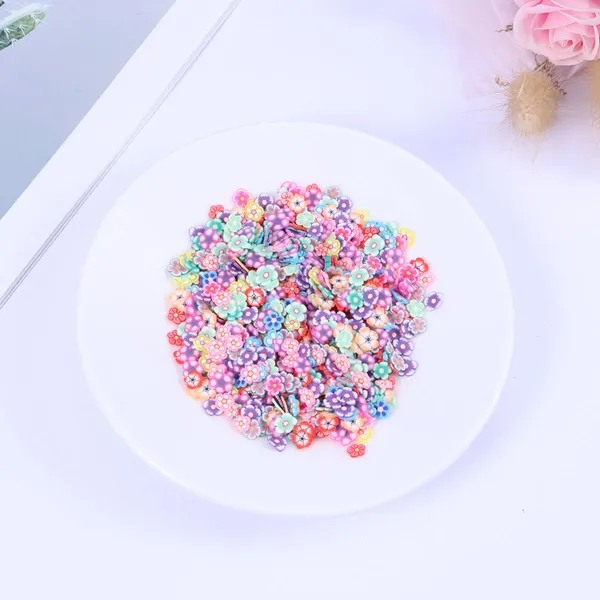 Nail Art Decorations 1000pcs Coloful en céramique DIY MANICURE OUTILS ACCULTOIRS SLICES POLYMER CLAY (Plum Blossom)