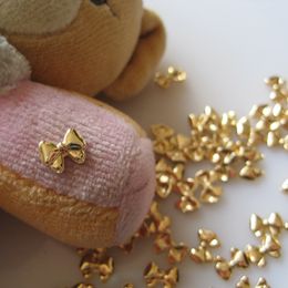 Decoraciones de uñas 100PC Mini Lovely Bowknot Nail Art Decoración Retro Oro Cromo Pajarita Aleación Encantos 3D Nudo de mariposa Partes Puntas de los dedos Ornamento 230729