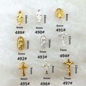 Décorations d'art d'ongle 100pc Saint Nail Charms Métal Japonais Design Jésus Judas Croix Or Argent 3D Alliage Accessoires Manucure Fourniture JE489-497 231123