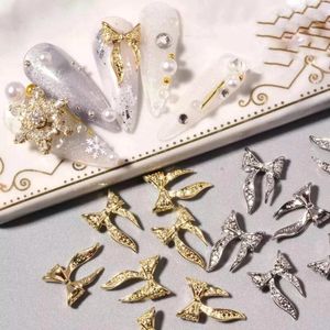 Nagelkunst Decoraties 50pcs 3D Legering Strik Schoonheidsontwerp Goud Zilver Strik Strass Glanzend Charms 9X15mm Lint Manicure Sieraden Ornamenten