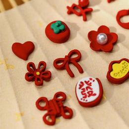 Decoraciones de arte de uñas Estilo chino Joyería de aleación de diamante Rojo Festivo Nacional Flor en forma de corazón Fortuna Caqui Accesorios para lazos