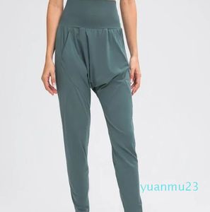 Pantalon de jogging de Sport d'entraînement en tissu à sensation nue pour femmes, taille haute, Fitness, course à pied, avec deux poches latérales, tenue de Yoga