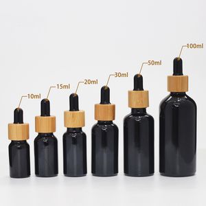 Dhgate Assurance Matte/Shinny Black Glass Materiaal Cosmetische serumfles met bamboe -druppel deksel 5 10 15 20 30 50 100 ml Boston Ronde baardoliefles Freeship