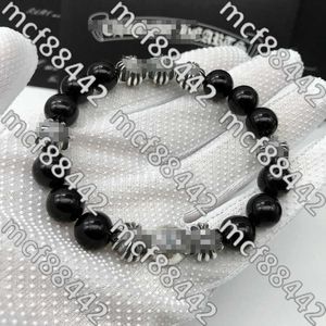 Obsidiana natural Ocho pulseras de cuentas de plata Pulsera cruzada retro europea y americana E9hg