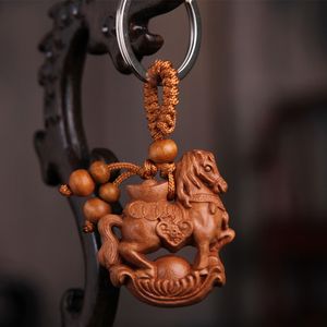 Natural Peach Wood 12 Zodiac Key Chain voor vrouwen Men Kind unisex sieraden sleutelhangers Animal Monkey Konijnen Snake Tiger Keychains