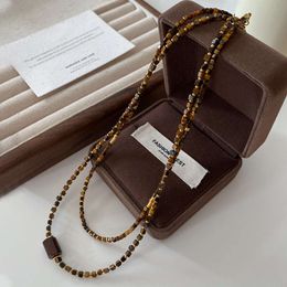 Collier de perlé en pierre naturelle avec une sensation avancée accessoires Maillard Fashion pour femmes et élégance Sweater Sweater Lock Bone