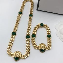 collier bracelets mode classique plaqué or 18 carats ensemble de deux pièces bracelet colliers designer pour femme vintage tête de lion émeraude s201y