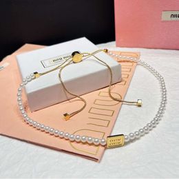 Concepteur de collier pour femme Mui Mui Mui Luxury Butterfly Collier MS Collier multi-fonctionnel Style de célébrité Perle longue chaîne Small Square Adjustable Cer