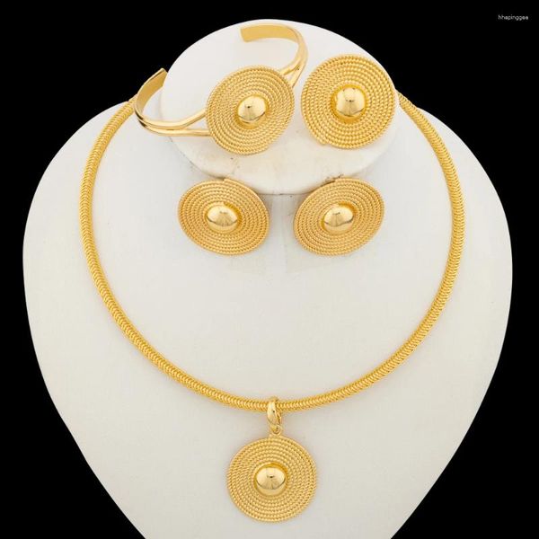 Conjunto de collar y pendientes para mujer, joyería africana de Color dorado, colgante redondo y Clip con anillo de brazalete, joyería de fiesta diaria