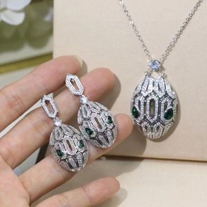 Collier Top bijoux de haute qualité pour femmes pendentifs serpent costume épais fines boucles d'oreilles luxueuses personnalisées éléments classiques de la photographie de rue