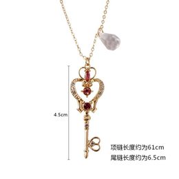 Colliers 10 pcs/lot accessoires de bijoux de mode carte captor alice acrylique coeur clé pendentif collier