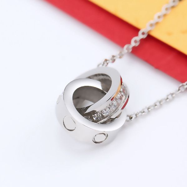 Colliers Designer Colliers DesignersJewelry Gold Sier Double Ring Christmas cadeau CJEWELER MENS FEMME DIAMAND LOVE PENDANT COLLES AVEC ACCESSOIR