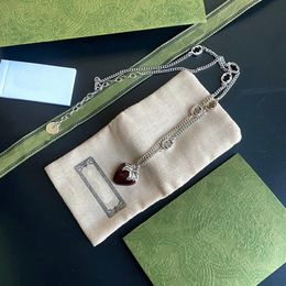 Colliers Strawberry Pendants Colliers de créateur bijoux pendentif collier d'extension matériau en cuivre Strip en acier imprime plaquée Real NE