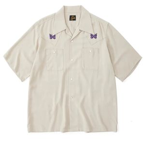 Nichons de denim Shirt Single Row de boutons poches conception mens pour femmes broderie à manches courtes à manches courtes T-shirt 240411