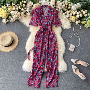 NEPLOE Vintage Kleped Hals Rompertjes Slanke Floral Print Zomer Volledige Lengte Bandage Jumpsuit Dames Elegant Office Playsuit 210423