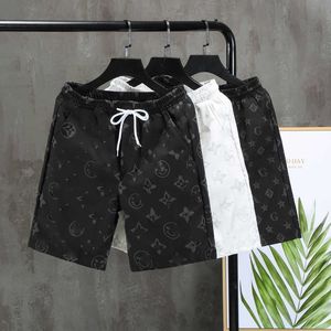 Net short populaire du même style hommes lâche style coréen recadrée tendance couture esprit gars grand séchage rapide