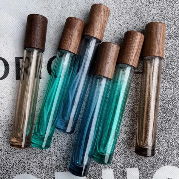 Nuevas botellas de perfume de vidrio de 10 ml, botellas de spray de prensa de color azul, verde y marrón, botellas rellenables vacías de aceite esencial de fragancia