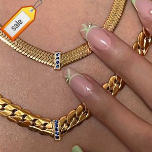 Nouveau 18k plaqué or sans ternissement en acier inoxydable Cnc bleu Zircon incrusté 7.5mm lame chaîne V collier plage vague bijoux