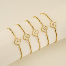 Nieuwe 18k goud roestvrijstalen schaal vier blad klaverbrief armband met high-end en niche-ontwerp veelzijdig voor damesarmbanden