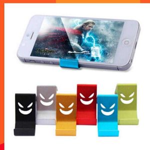 NIEUWE 1PC Smile Metal Cell Car Holder Universal Phone Stander Random Color Bracket Holder Mobiele telefoon Auto -auto -accessoires