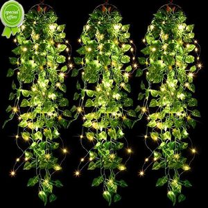 Nuevo 2.9 pies que brillan en la oscuridad LED Planta colgante artificial Vid Hogar Colgante de pared Hojas falsas Luces de cadena Decoraciones de boda