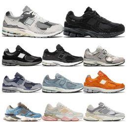 NOUVEAU 2002R Protection Pack Balance 9060 V2 2002r Sports Chaussures Designer Light Arctic Men Femmes Pink Phantom Blanc Ballance Boulance Grey Salt de mer Gris 2002 R Rain Cloud Sneakers