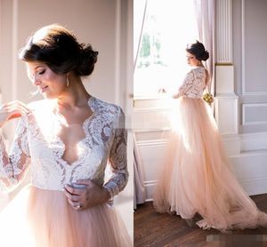 Romantische v-hals champagne boho trouwjurken bruidsjurken illusie lange mouwen tule court trein kant holle applique goedkoop