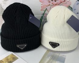 NIEUW 2023 Groothandel beanie Winterkappen Hoeden vrouwen en mannenvermenigingen met echte wasbeer bont pompoms warme meid cap snapback pompon beanie hoed mode accessoires pp-1