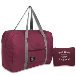 Nouveaux sacs de rangement de grande capacité 2024 Bagins de voyage en nylon pliables organisateurs de vêtements unisexes de bagages à main imperméables sacs à main