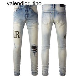 Nieuwe 23ss Designer stack jeans Europese paarse jean heren borduurwerk quilten gescheurd trend vintage slanke magere modemerk amirs heren dames broek