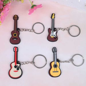 Nuevo llavero de instrumento de silicona suave de 2 uds, llavero de ukelele de guitarra clásica eléctrica popular, llavero de alta calidad al por mayor G1019