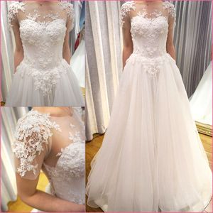 Echte foto Vintage Land Trouwjurken Sheer Neck Juweel Kant Bloemen Applicaties Boheemse Trouwjurk Illusion Back Bridal Toga Mouwen