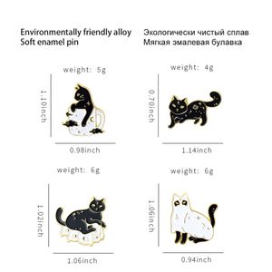Nieuwe legering dierenbroche Creatieve cartoon schattige zwart -witte katvorm gebakken verfbadia kledingaccessoires
