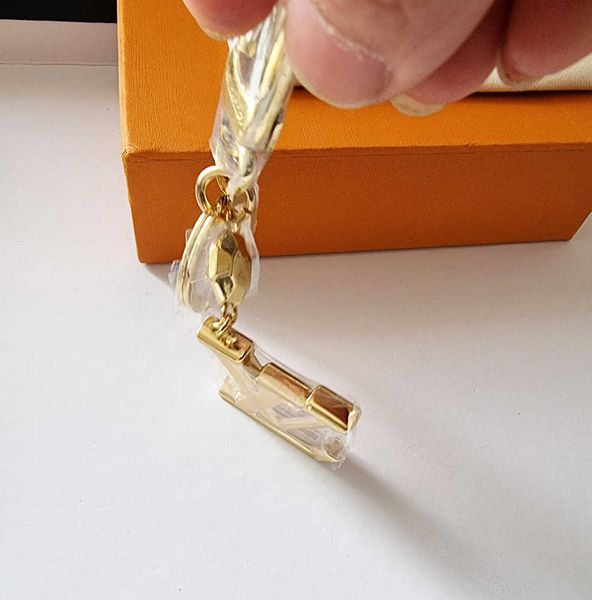 Nouveau alliage or conception astronaute porte-clés accessoires concepteur porte-clés solide métal voiture porte-clés emballage cadeau
