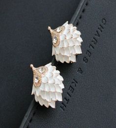 Nouveaux goujons d'oreille animale électroplités peinture en noir et blanc de petites boucles d'oreilles naturelles et de style frais ventes2508183