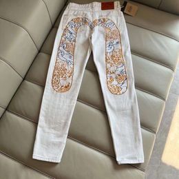 Nouvel Abricot Fushen Jeans décontracté avec chinois imprimé brodé Xiangyun 2023 pantalon lâche 395102
