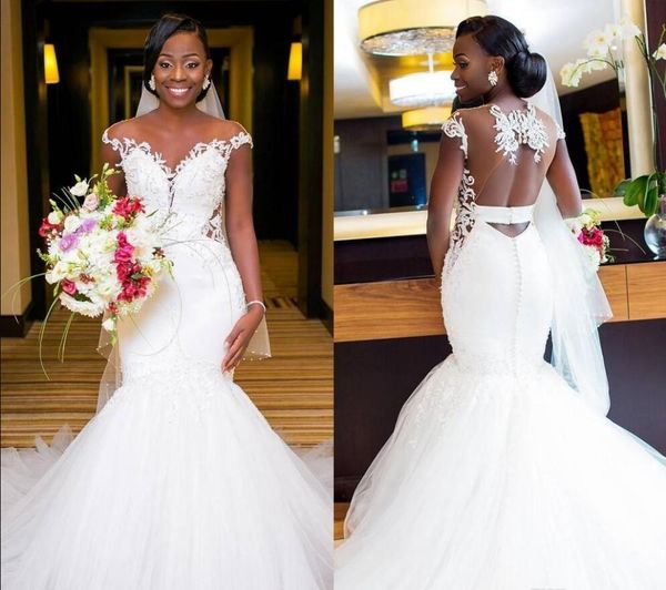 Nueva llegada Vestidos de novia de sirena africana 2019 Ilusión Sin espalda Apliques de encaje Tren de la corte Vestido de novia de sirena Vestidos de novia de talla grande